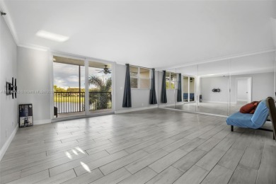 Remodeled apartment with stunning golf course and lake views! on Grande Oaks Golf Club in Florida - for sale on GolfHomes.com, golf home, golf lot