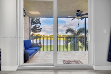 Remodeled apartment with stunning golf course and lake views! on Grande Oaks Golf Club in Florida - for sale on GolfHomes.com, golf home, golf lot