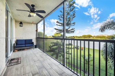 Remodeled apartment with stunning golf course and lake views! on Grande Oaks Golf Club in Florida - for sale on GolfHomes.com, golf home, golf lot