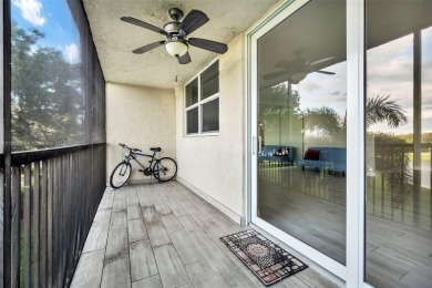 Remodeled apartment with stunning golf course and lake views! on Grande Oaks Golf Club in Florida - for sale on GolfHomes.com, golf home, golf lot