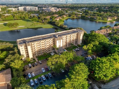 Remodeled apartment with stunning golf course and lake views! on Grande Oaks Golf Club in Florida - for sale on GolfHomes.com, golf home, golf lot