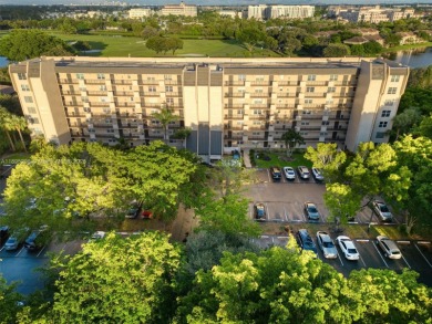 Remodeled apartment with stunning golf course and lake views! on Grande Oaks Golf Club in Florida - for sale on GolfHomes.com, golf home, golf lot