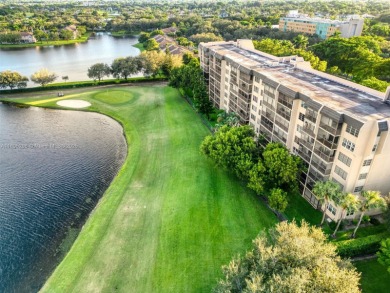 Remodeled apartment with stunning golf course and lake views! on Grande Oaks Golf Club in Florida - for sale on GolfHomes.com, golf home, golf lot