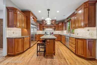 This EXQUISITE all-brick home is nestled on Signature Hole #3 of on Royal Fox Country Club in Illinois - for sale on GolfHomes.com, golf home, golf lot