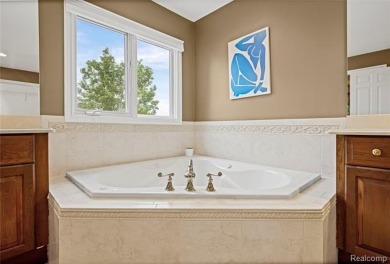 Welcome to the highly sought after Twin Lakes Golf and Swim Club on Twin Lakes Golf Club in Michigan - for sale on GolfHomes.com, golf home, golf lot