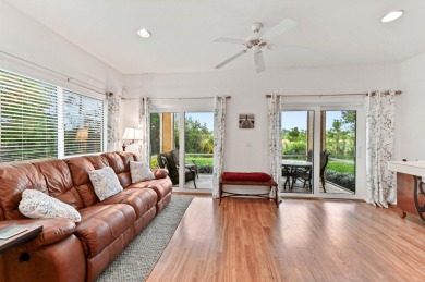 Welcome to your first floor, end-unit condo overlooking the on The Legacy Golf and Tennis Club in Florida - for sale on GolfHomes.com, golf home, golf lot