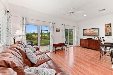 Welcome to your first floor, end-unit condo overlooking the on The Legacy Golf and Tennis Club in Florida - for sale on GolfHomes.com, golf home, golf lot