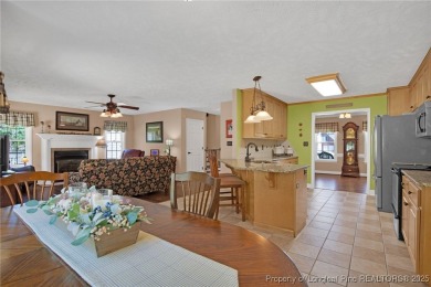 Welcome to 4402 Bluebush Drive. Nestled in the back of the on Baywood Golf Club in North Carolina - for sale on GolfHomes.com, golf home, golf lot