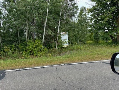 1.77 acre wooded lot on 5th hole of Frederic WI golf course. All on Frederic Country Club Inc. in Wisconsin - for sale on GolfHomes.com, golf home, golf lot