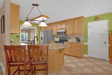 Welcome to 4402 Bluebush Drive. Nestled in the back of the on Baywood Golf Club in North Carolina - for sale on GolfHomes.com, golf home, golf lot