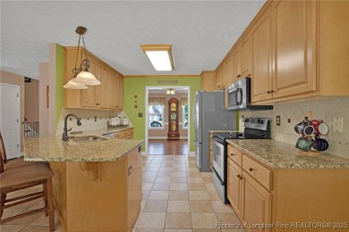 Welcome to 4402 Bluebush Drive. Nestled in the back of the on Baywood Golf Club in North Carolina - for sale on GolfHomes.com, golf home, golf lot