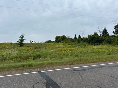 1.77 acre wooded lot on 5th hole of Frederic WI golf course. All on Frederic Country Club Inc. in Wisconsin - for sale on GolfHomes.com, golf home, golf lot