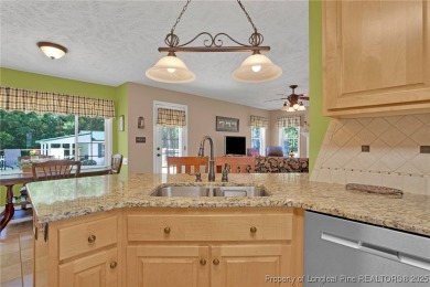 Welcome to 4402 Bluebush Drive. Nestled in the back of the on Baywood Golf Club in North Carolina - for sale on GolfHomes.com, golf home, golf lot