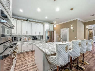 Step into a world of refined elegance and sophistication at this on Walden Lake Golf and Country Club  in Florida - for sale on GolfHomes.com, golf home, golf lot