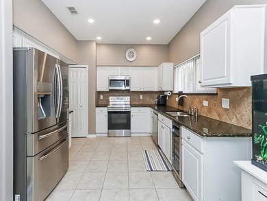 WELCOME TO THIS BEAUTIFUL HOME IN THE PRIVILEGED COMMUNITY OF on Stoneybrook East Golf Club in Florida - for sale on GolfHomes.com, golf home, golf lot