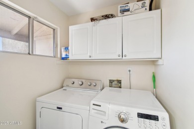 Welcome to this charming 2-bedroom, 2-bathroom townhome located on Bellaire Golf Club in Arizona - for sale on GolfHomes.com, golf home, golf lot