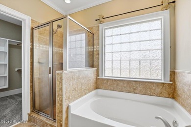 Welcome home to this custom-built 4-bedroom, 3-bathroom home in on Walnut Creek Country Club in North Carolina - for sale on GolfHomes.com, golf home, golf lot