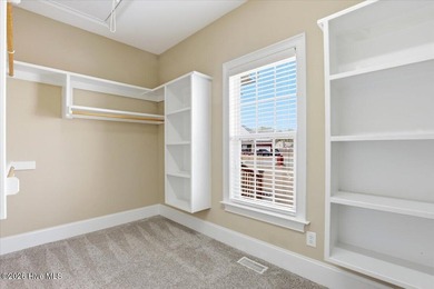 Welcome home to this custom-built 4-bedroom, 3-bathroom home in on Walnut Creek Country Club in North Carolina - for sale on GolfHomes.com, golf home, golf lot