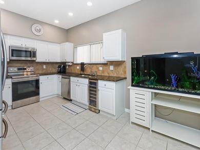WELCOME TO THIS BEAUTIFUL HOME IN THE PRIVILEGED COMMUNITY OF on Stoneybrook East Golf Club in Florida - for sale on GolfHomes.com, golf home, golf lot