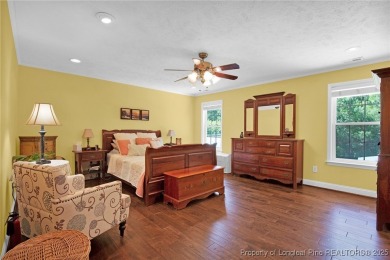 Welcome to 4402 Bluebush Drive. Nestled in the back of the on Baywood Golf Club in North Carolina - for sale on GolfHomes.com, golf home, golf lot