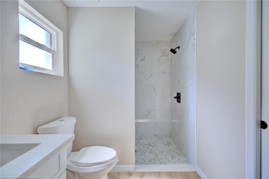 Welcome to this beautiful new construction home in the desirable on Harder Hall Exec Golf Course in Florida - for sale on GolfHomes.com, golf home, golf lot