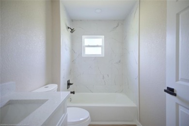 Welcome to this beautiful new construction home in the desirable on Harder Hall Exec Golf Course in Florida - for sale on GolfHomes.com, golf home, golf lot