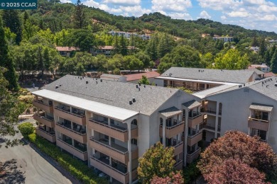 Welcome to the Villa Barcelona, a lovely top-floor condo in on Rossmoor Golf Course in California - for sale on GolfHomes.com, golf home, golf lot