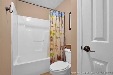 Welcome to 4402 Bluebush Drive. Nestled in the back of the on Baywood Golf Club in North Carolina - for sale on GolfHomes.com, golf home, golf lot