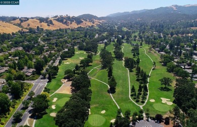Welcome to the Villa Barcelona, a lovely top-floor condo in on Rossmoor Golf Course in California - for sale on GolfHomes.com, golf home, golf lot