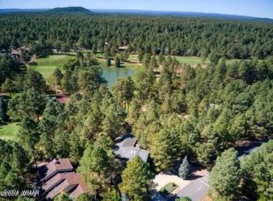 Here's your dream home crafted with love and precision. This on Pinetop Lakes Country Club in Arizona - for sale on GolfHomes.com, golf home, golf lot