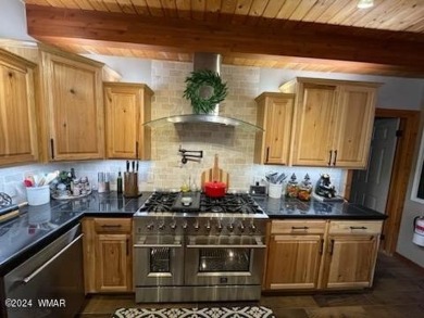 Here's your dream home crafted with love and precision. This on Pinetop Lakes Country Club in Arizona - for sale on GolfHomes.com, golf home, golf lot