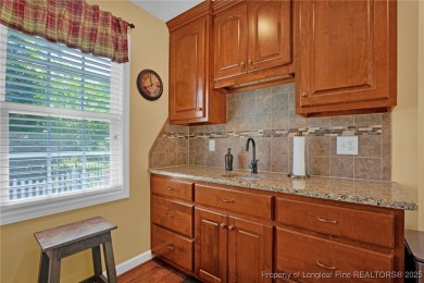 Welcome to 4402 Bluebush Drive. Nestled in the back of the on Baywood Golf Club in North Carolina - for sale on GolfHomes.com, golf home, golf lot
