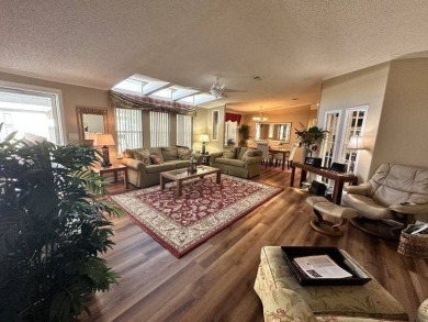 This partially furnished residence has so much to offer! on Four Lakes Golf Club in Florida - for sale on GolfHomes.com, golf home, golf lot