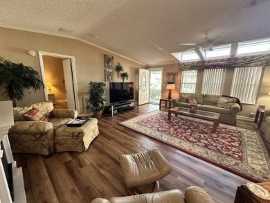 This partially furnished residence has so much to offer! on Four Lakes Golf Club in Florida - for sale on GolfHomes.com, golf home, golf lot