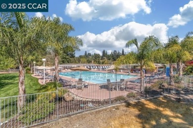 Welcome to the Villa Barcelona, a lovely top-floor condo in on Rossmoor Golf Course in California - for sale on GolfHomes.com, golf home, golf lot