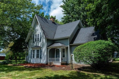 Discover the timeless charm of 9980 Tittabawassee, a historic on Golf Club At Apple Mountain in Michigan - for sale on GolfHomes.com, golf home, golf lot