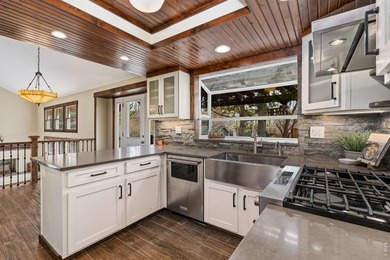 Welcome to this beautifully updated home in the highly on Collindale Golf Course in Colorado - for sale on GolfHomes.com, golf home, golf lot