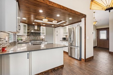 Welcome to this beautifully updated home in the highly on Collindale Golf Course in Colorado - for sale on GolfHomes.com, golf home, golf lot