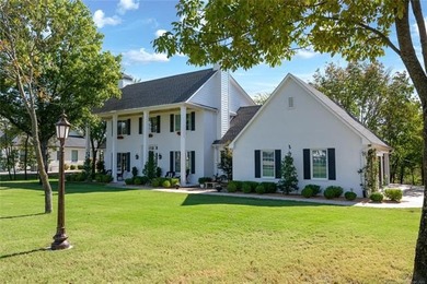 Experience timeless elegance and Southern charm in this on The Patriot in Oklahoma - for sale on GolfHomes.com, golf home, golf lot