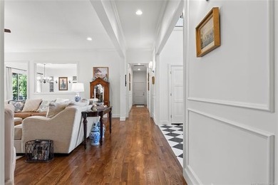 Experience timeless elegance and Southern charm in this on The Patriot in Oklahoma - for sale on GolfHomes.com, golf home, golf lot