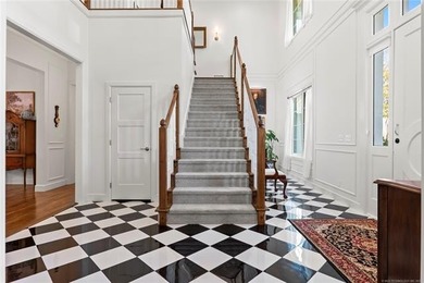 Experience timeless elegance and Southern charm in this on The Patriot in Oklahoma - for sale on GolfHomes.com, golf home, golf lot