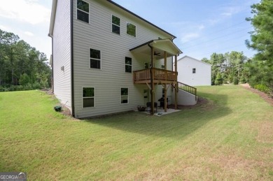 Built in 2023, this like-new home has everything you've been on Brookstone Golf and Country Club in Georgia - for sale on GolfHomes.com, golf home, golf lot