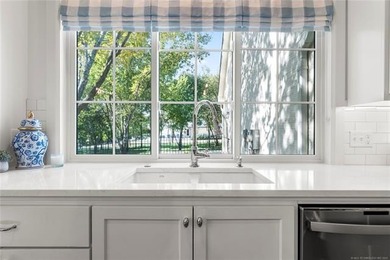 Experience timeless elegance and Southern charm in this on The Patriot in Oklahoma - for sale on GolfHomes.com, golf home, golf lot