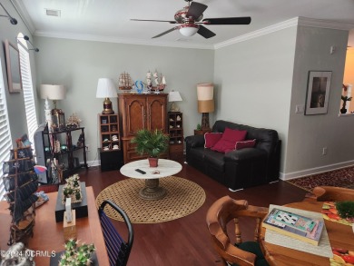 A beach getaway with three bedrooms PLUS an income producing on Sea Trail Golf Resort in North Carolina - for sale on GolfHomes.com, golf home, golf lot