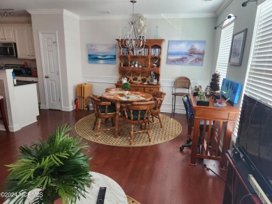 A beach getaway with three bedrooms PLUS an income producing on Sea Trail Golf Resort in North Carolina - for sale on GolfHomes.com, golf home, golf lot