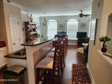 A beach getaway with three bedrooms PLUS an income producing on Sea Trail Golf Resort in North Carolina - for sale on GolfHomes.com, golf home, golf lot
