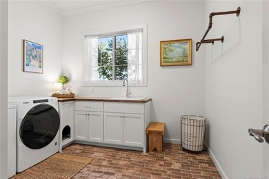 Experience timeless elegance and Southern charm in this on The Patriot in Oklahoma - for sale on GolfHomes.com, golf home, golf lot