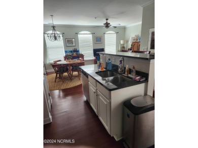 A beach getaway with three bedrooms PLUS an income producing on Sea Trail Golf Resort in North Carolina - for sale on GolfHomes.com, golf home, golf lot