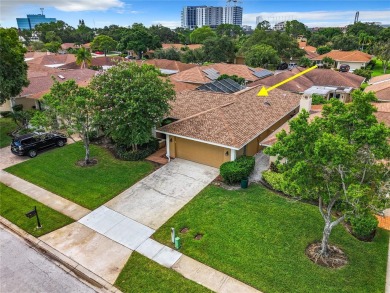 Welcome to your dream home in the serene Feather Sound Country on Feather Sound Country Club in Florida - for sale on GolfHomes.com, golf home, golf lot