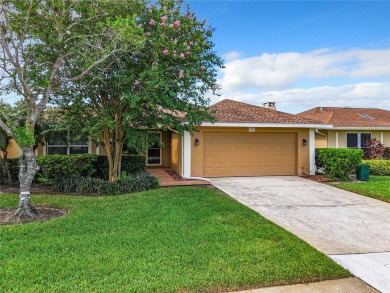 Welcome to your dream home in the serene Feather Sound Country on Feather Sound Country Club in Florida - for sale on GolfHomes.com, golf home, golf lot